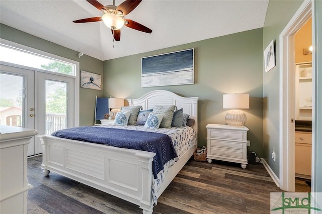 bedroom featuring access to outside, ceiling fan, french doors, lofted ceiling, and dark wood-type flooring