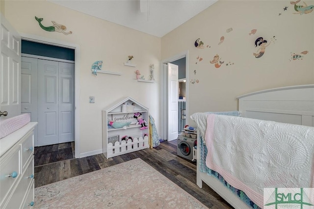 bedroom featuring baseboards and wood finished floors