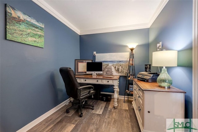 office space with baseboards, ornamental molding, and wood finished floors