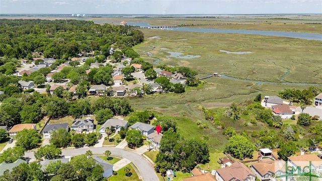 birds eye view of property with a residential view and a water view