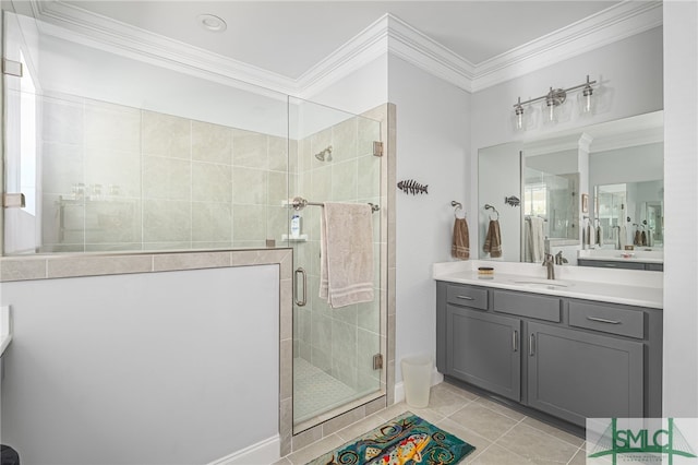 full bath with tile patterned flooring, crown molding, vanity, and a shower stall