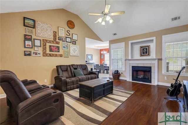 1212 Peacock Trl, Hinesville, GA 31313 - living room featuring a ceiling fan, visible vents, wood finished floors, and vaulted ceiling