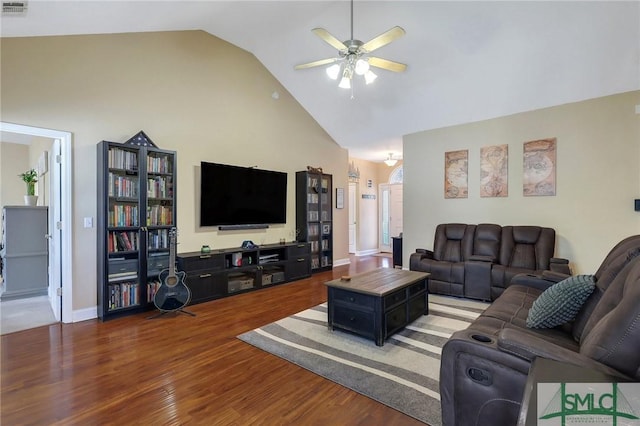 1212 Peacock Trl, Hinesville, GA 31313 - living room featuring high vaulted ceiling, a ceiling fan, baseboards, wood finished floors, and visible vents