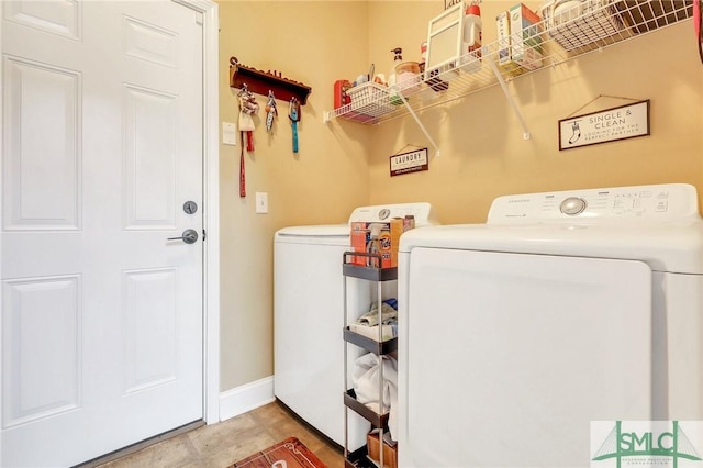 1212 Peacock Trl, Hinesville, GA 31313 - clothes washing area with laundry area, baseboards, and independent washer and dryer