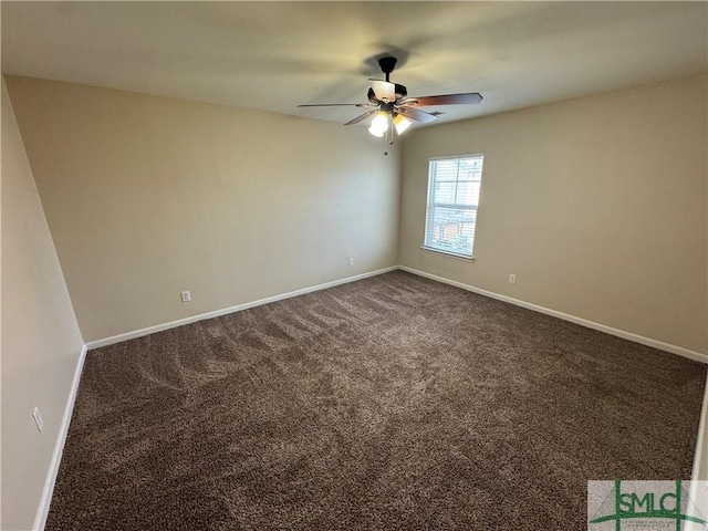 empty room with baseboards, a ceiling fan, and dark carpet
