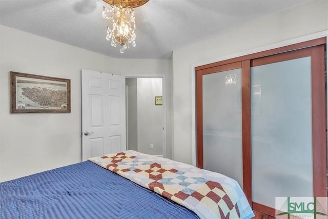 bedroom featuring a closet and wood finished floors