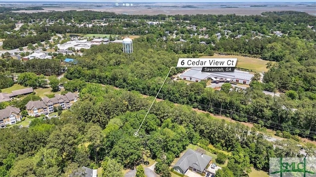 aerial view with a wooded view