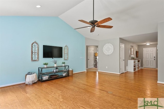 76 Hamilton Grove Dr, Pooler, GA 31322 - living room with vaulted ceiling, baseboards, a ceiling fan, and wood finished floors