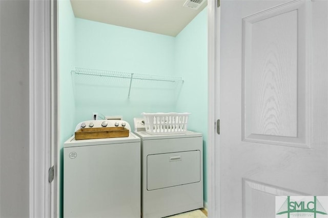 76 Hamilton Grove Dr, Pooler, GA 31322 - laundry area with visible vents and washing machine and clothes dryer