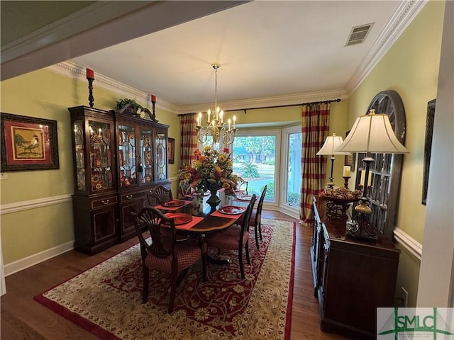 31 Sweetgum Xing, Savannah, GA 31411 - dining room featuring a chandelier, wood finished floors, and crown molding