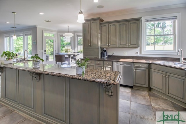 kitchen featuring visible vents, a sink, dishwasher, and ornamental molding
