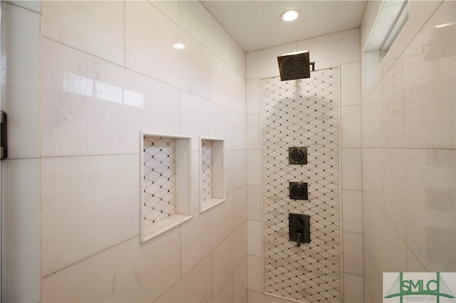 full bath with recessed lighting and a tile shower