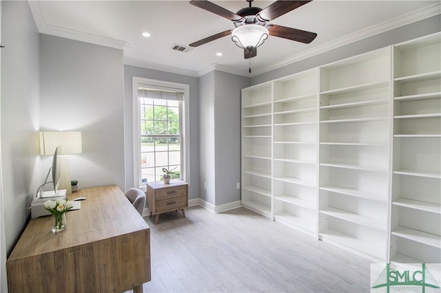 home office featuring visible vents, ornamental molding, baseboards, and ceiling fan