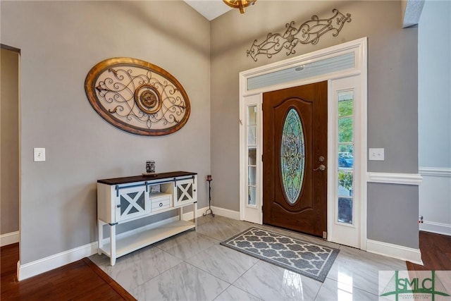 entrance foyer featuring baseboards