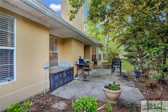 view of patio / terrace featuring fence and area for grilling