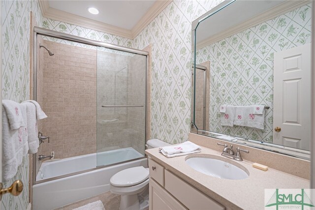 bathroom featuring vanity, ornamental molding, toilet, shower / bath combination with glass door, and wallpapered walls