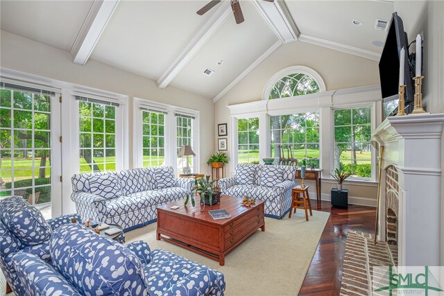 living area featuring ceiling fan, beamed ceiling, wood finished floors, and visible vents