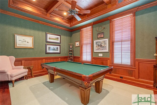 playroom with coffered ceiling, ornamental molding, wainscoting, and ceiling fan