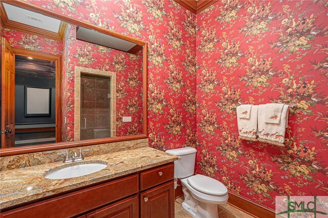 bathroom with tile patterned flooring, visible vents, vanity, toilet, and baseboards