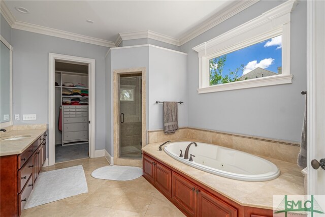 full bathroom featuring vanity, a jetted tub, a spacious closet, ornamental molding, and a stall shower