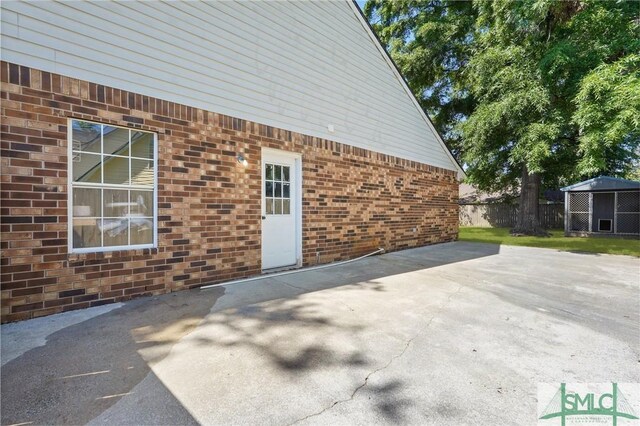121 Pelican Ln, Richmond Hill, GA 31324 - view of patio with fence