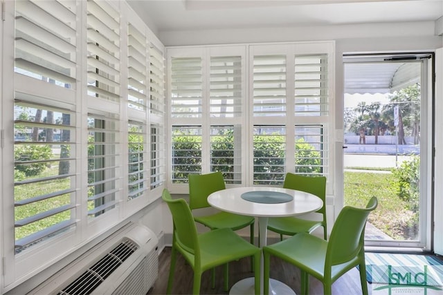 sunroom featuring baseboard heating