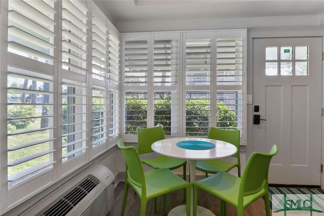 sunroom / solarium with plenty of natural light and french doors