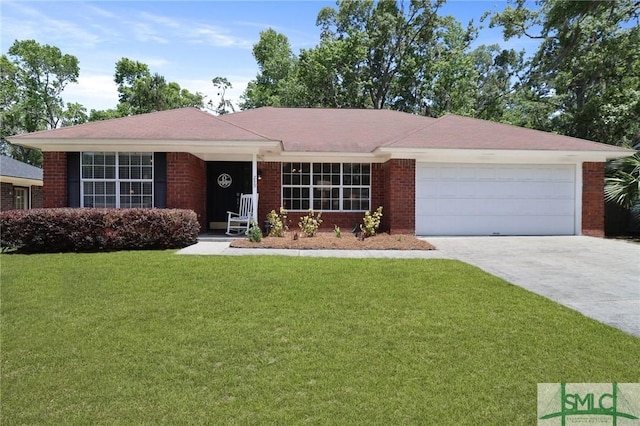 ranch-style home with an attached garage, concrete driveway, brick siding, and a front yard