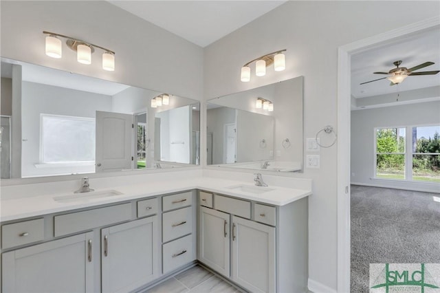 291 Cromer St, Savannah, GA 31407 - bathroom with double vanity, a sink, and a ceiling fan