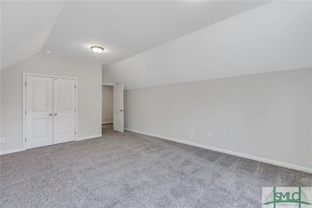 291 Cromer St, Savannah, GA 31407 - additional living space with carpet floors, baseboards, and lofted ceiling