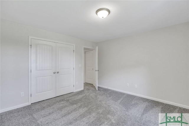 291 Cromer St, Savannah, GA 31407 - unfurnished bedroom with baseboards, carpet, and a closet
