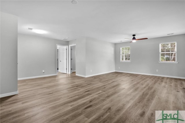 108 Church St, Bloomingdale, GA 31302 - spare room featuring wood finished floors and a ceiling fan