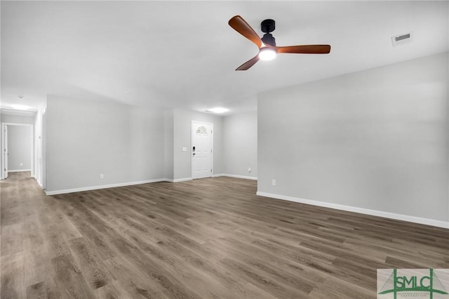 108 Church St, Bloomingdale, GA 31302 - unfurnished living room featuring a ceiling fan and wood finished floors