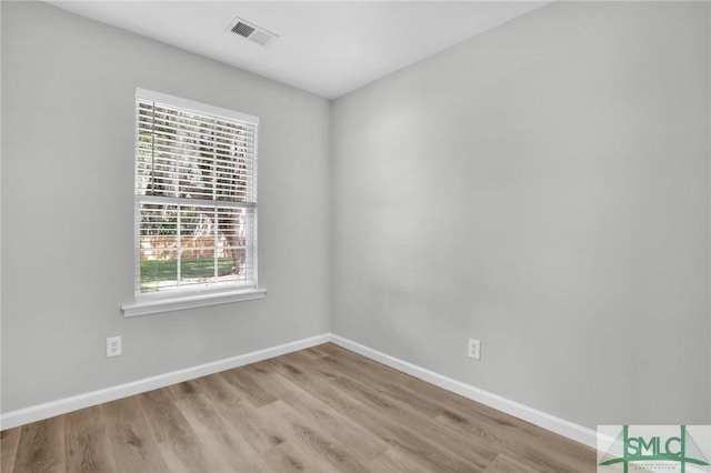 108 Church St, Bloomingdale, GA 31302 - empty room with wood finished floors and baseboards