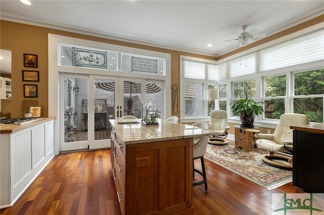 sunroom with a sink