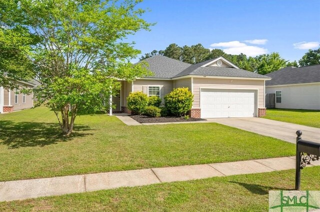view of front of property featuring an attached garage, brick siding, a front yard, and concrete driveway