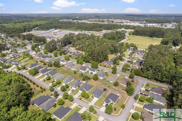 drone / aerial view with a residential view