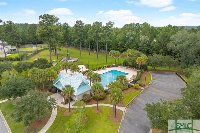 community pool with a lawn