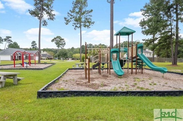 community playground featuring a lawn