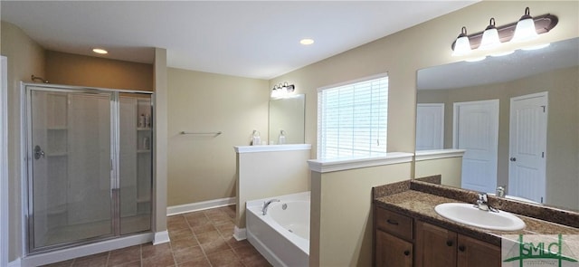 14 Canterbury Rd NE, Ludowici, GA 31316 - full bathroom featuring tile patterned flooring, vanity, baseboards, a bath, and a stall shower