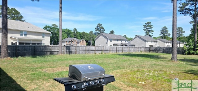 14 Canterbury Rd NE, Ludowici, GA 31316 - view of yard featuring fence and a residential view