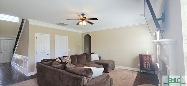 14 Canterbury Rd NE, Ludowici, GA 31316 - living area with ceiling fan, arched walkways, dark wood finished floors, visible vents, and ornamental molding