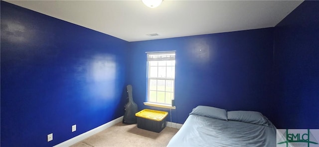 14 Canterbury Rd NE, Ludowici, GA 31316 - carpeted bedroom with baseboards and visible vents