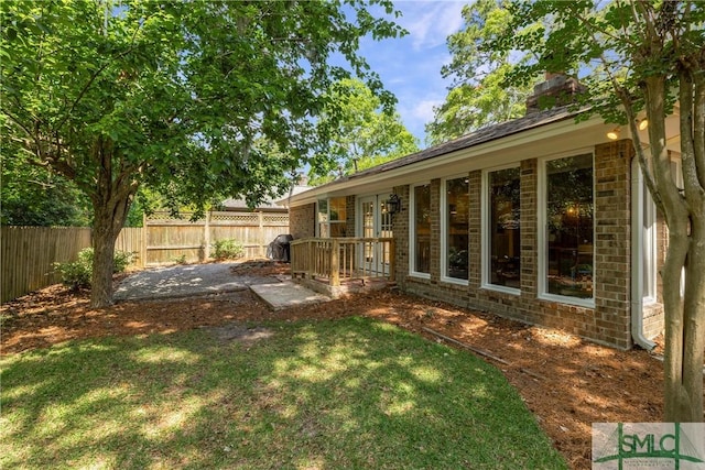view of yard with a fenced backyard