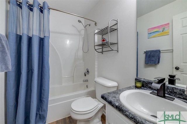 bathroom with toilet, shower / bathtub combination with curtain, wood finished floors, and vanity
