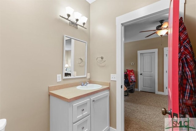 bathroom featuring vanity and ceiling fan