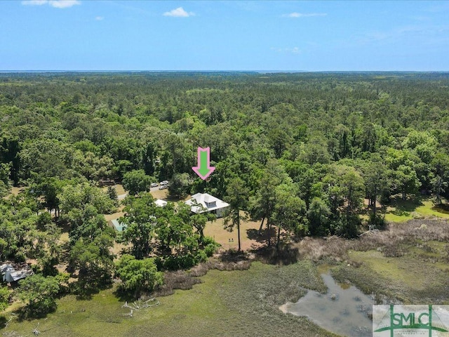 drone / aerial view with a forest view