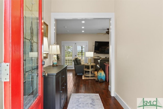 hallway with baseboards, french doors, recessed lighting, and dark wood-type flooring