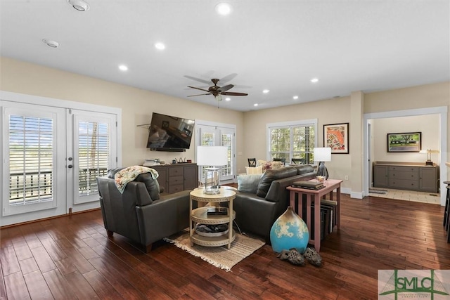 living room featuring recessed lighting, baseboards, ceiling fan, and wood finished floors