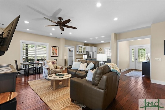 living room with dark wood finished floors, baseboards, a ceiling fan, and recessed lighting
